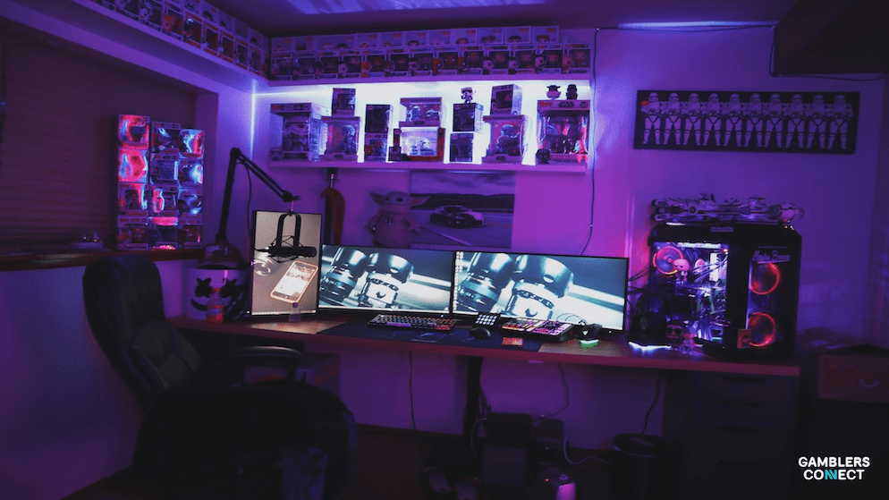 A gaming setup featuring multiple screens, a comfortable chair, and various decorations, representing the dedicated space where streamers like Adin Ross build their community and broadcast content, including discussions around his adin ross gf and upcoming fights on the adin ross fight card.