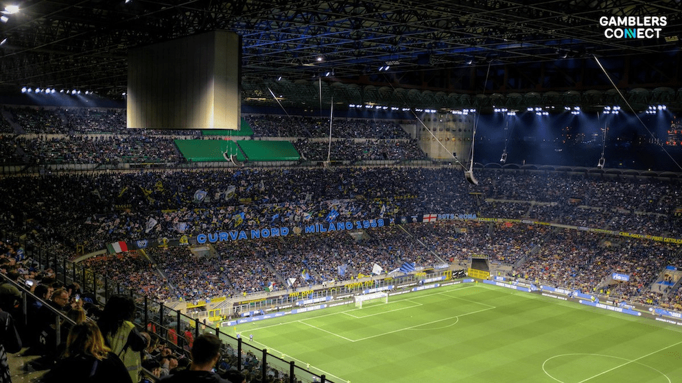 A shot of a football match in a Serie A stadium, perhaps with a player taking a shot on goal.