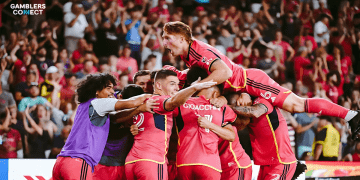 St Louis City SC players celebrating a goal in front of their fans, representing the excitement around the club's new partnership with FanDuel, which will bring online sports betting to Missouri.