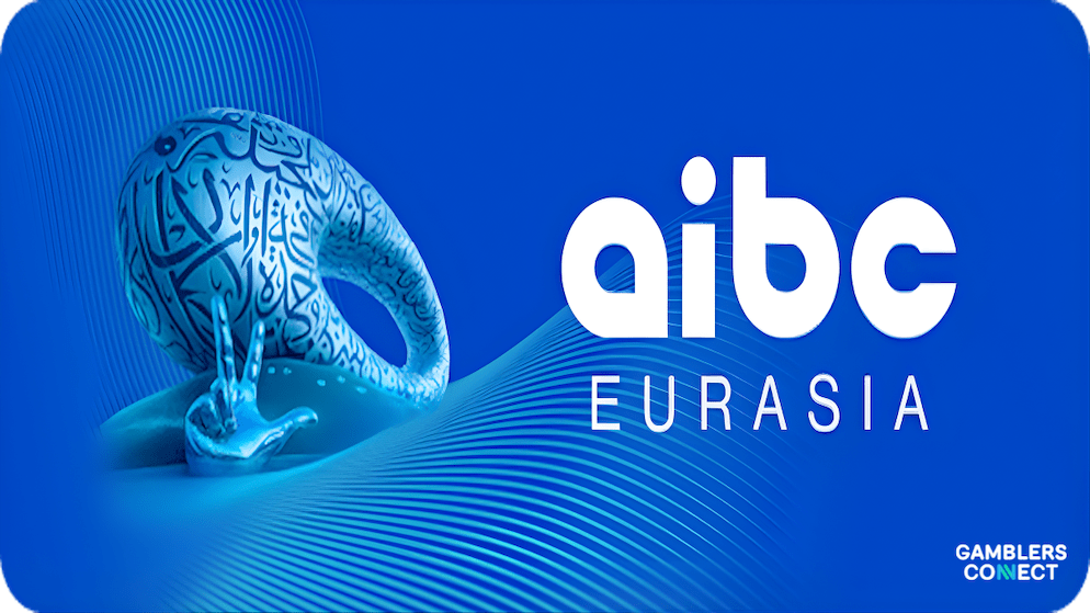 The AIBC Eurasia logo on a blue background, representing the digital tools like the Match App and the exclusive networking opportunities available to delegates in Dubai.