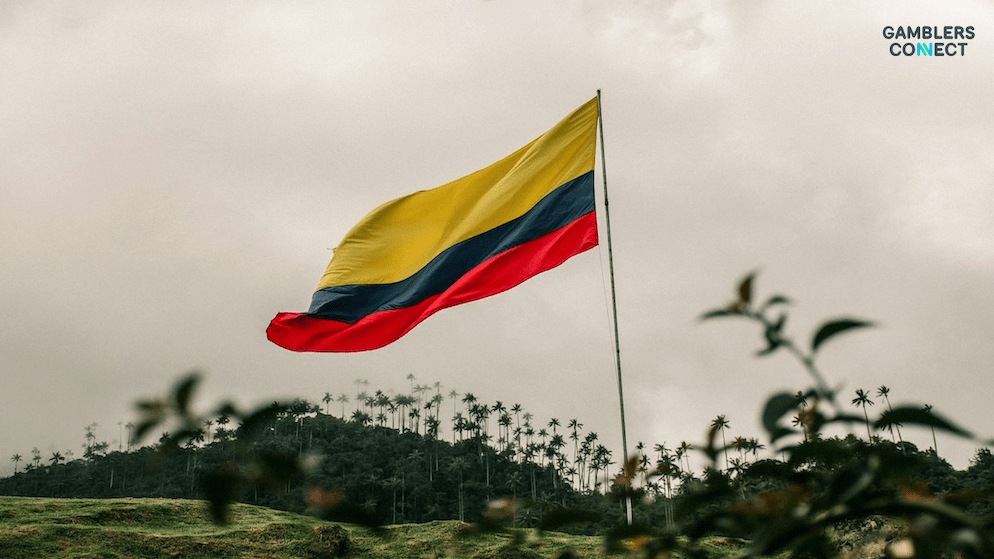 A scenic view of the Colombian flag, symbolizing the robust growth of the betting industry which contributed over COP 1.06 trillion to the national health system in 2025.