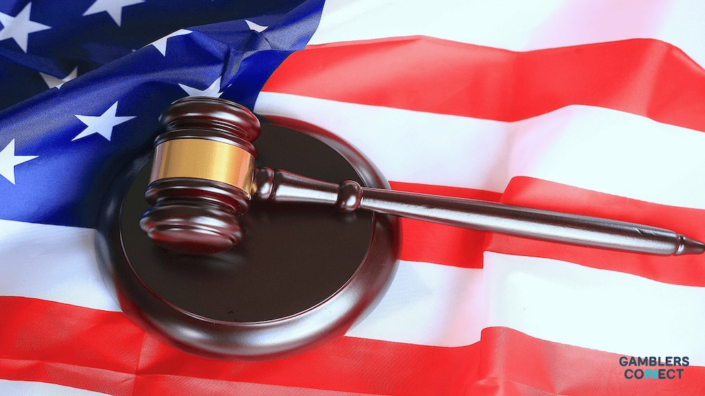 A view of the Fremont East District sign in Las Vegas at sunset, representing the heart of Nevada's regulated gaming industry and the lawsuit against Polymarket.