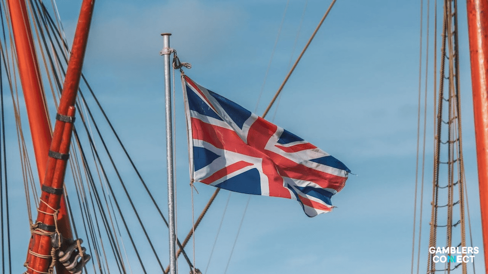 A close-up of casino chips and cards, representing the betting products that are heavily marketed to the UK public on TV and online.