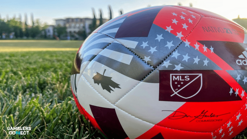 An Adidas MLS match ball on the pitch, representing the new data-driven fan engagement tools and real-time sentiment tracking provided by the Polymarket collaboration.