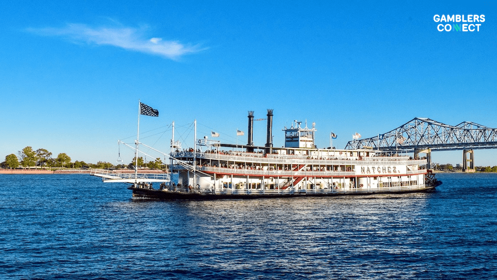 A scenic view of a riverboat on the Mississippi River, symbolizing the tension between expanding mobile wagering and protecting existing casino interests.