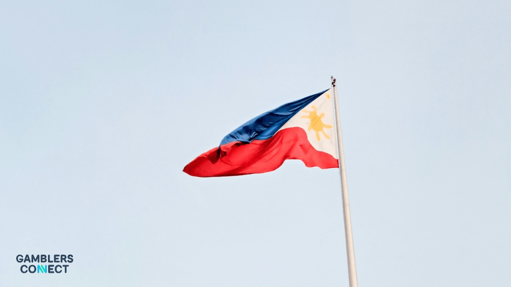 A view of the Philippines flag, symbolizing the strict regulatory framework enforced by PAGCOR to protect players from "fly-by-night" scams and the help of content creators to battle illegal gambling.