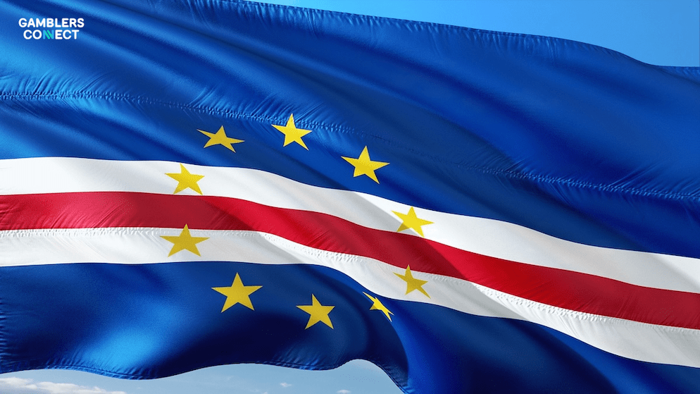 A close-up of the Cape Verde national flag, representing the regulatory actions taken to revoke gambling rights from non-compliant investors.