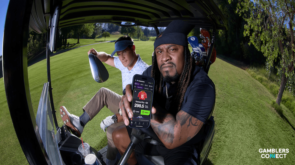 The corporate logo of Allwyn displayed on a modern office building, representing their expansion into the US market.