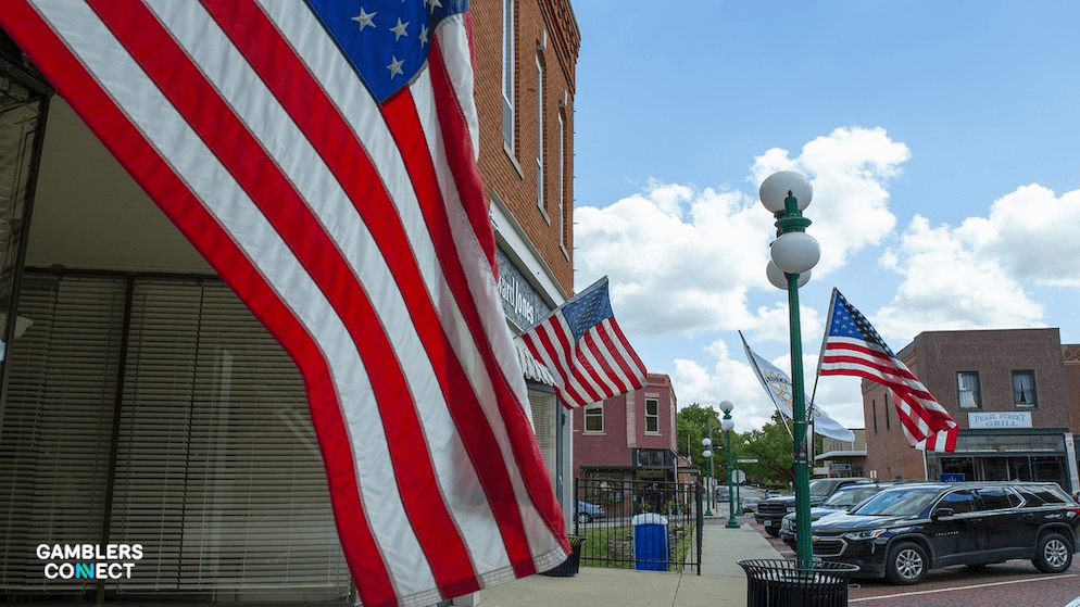 US flags depicting the quarrel of the Governor of Maine under pressure to veto the new gambling bill