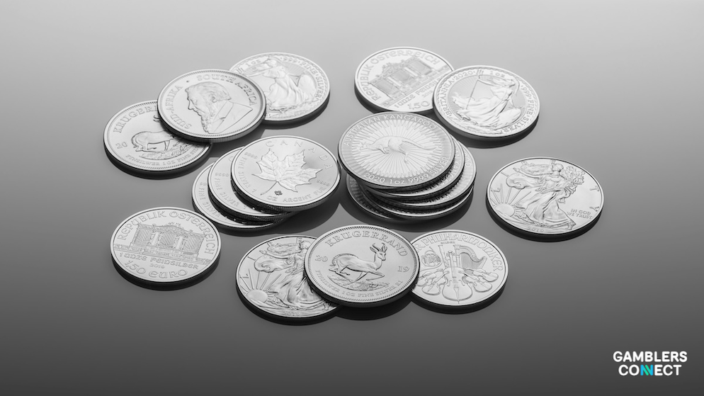 Documents and magnifying glass illustrating a regulatory AML inspection in the gambling industry.