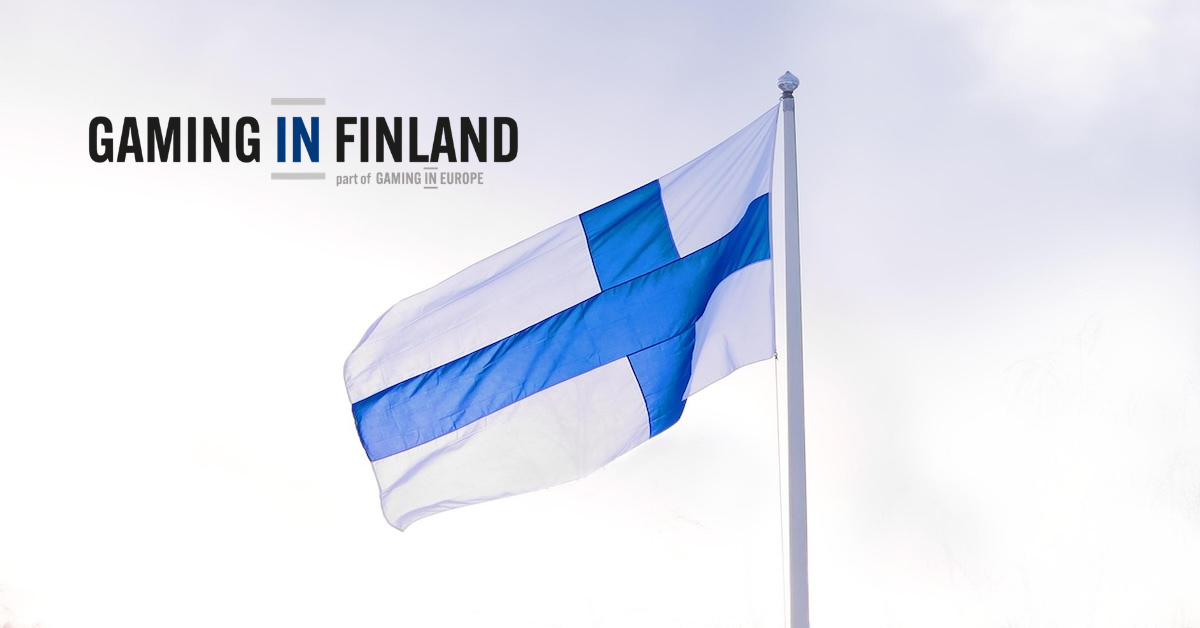 A close-up view of the Finnish national flag with the "Gaming in Finland" logo, representing the upcoming regulatory shift and license application process in 2027.